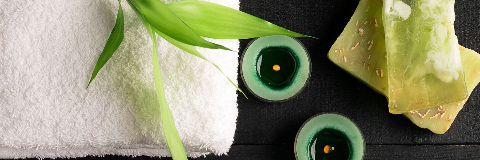 Folded Towel with Candles Burning 1 Folded Towel with Candles Burning 1